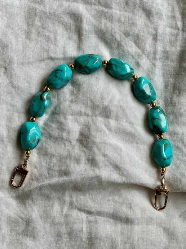 Perler på en snor - turkis