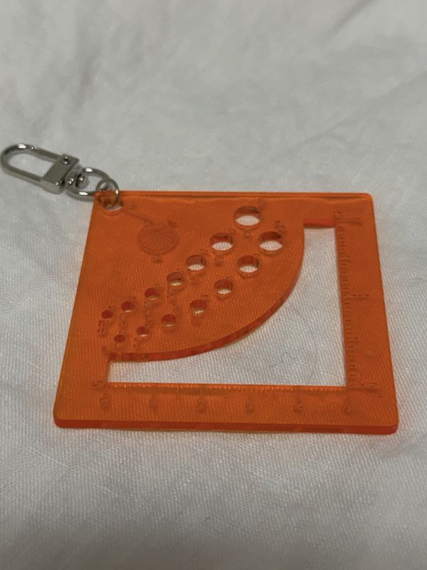 Strikkefasthet og pinnestørrelse måler resin - Orange